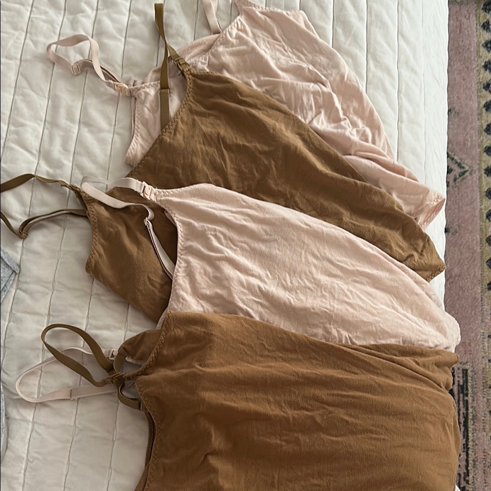 Bundle of 4 Storq soft touch nursing tanks.